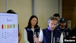 FILE - Director-General of the International Atomic Energy Agency (IAEA) Rafael Grossi speaks to reporters after his return from Ukraine where he and his team visited the Zaporizhzhia nuclear plant, at Vienna airport, in Schwechat, Austria, Sept. 2, 2022.