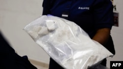 Cocaine (Photo by Ludovic MARIN/AFP)