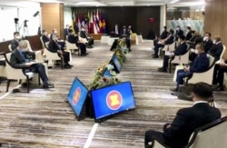In this photo released by Indonesian Presidential Palace, ASEAN leaders convene during their meeting at the ASEAN Secretariat in Jakarta, Indonesia, Saturday, April 24, 2021. Southeast Asian leaders met Myanmar's top general and coup leader in an emergenc