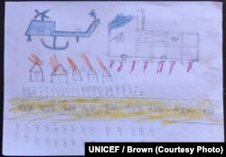 A drawing by a Rohingya boy, Abdullah, reveals the horrific experiences he endured while fleeing from Myanmar to Bangladesh, at a child-friendly space at the Balukhali makeshift refugee camp in Cox’s Bazar district in Bangladesh, Oct. 2, 2017.