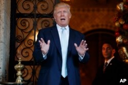 Donald Trump speaking to reporters.