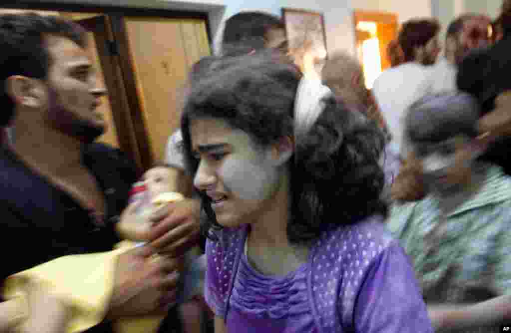 Mount Sinabung spews volcanic material as it erupts as seen from Tiga Pancur, North Sumatra, Indonesia, Nov. 18, 2013. 