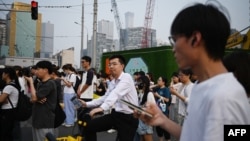 中國已決定自明年起逐步將法定退休年齡延遲3-5年。 （資料照：2024年7月9日北京某處市民過街）