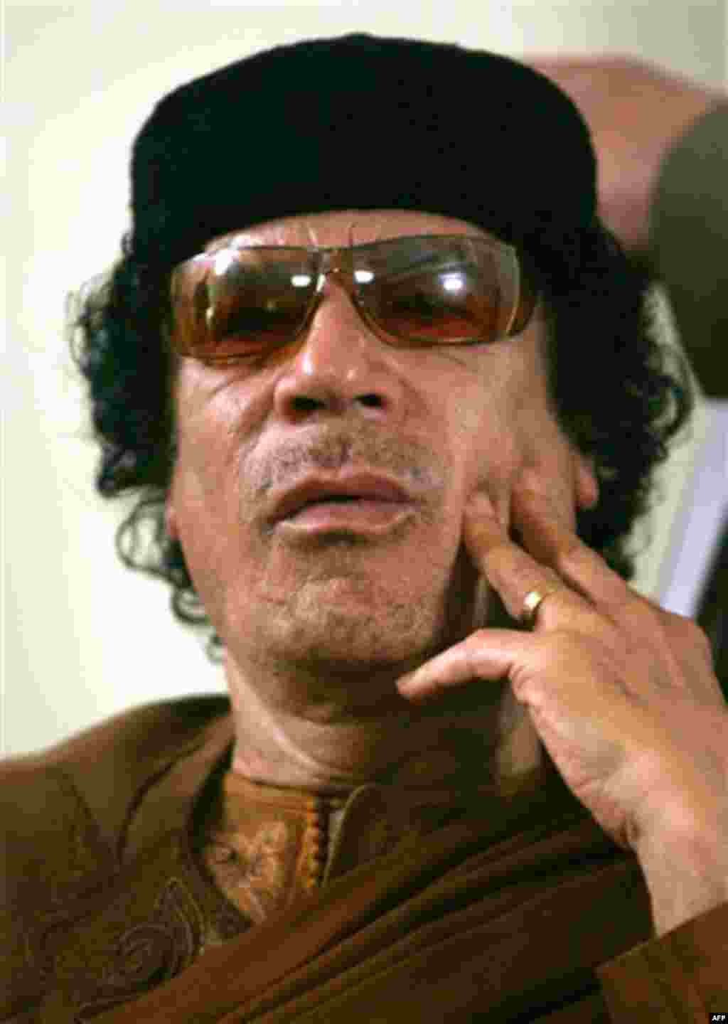 FILE.- This Friday, March 2, 2007 file photo shows Libya's Moammar Gadhafi in Sabha, Libya Friday, March 2, 2007. Hundreds of Libyans calling for the government's ouster took to the streets early Wednesday in the country's second-largest city as Egypt-in