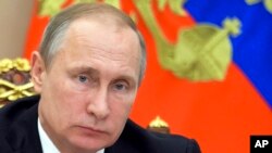 Le président russe Vladimir Poutine au Kremlin à Moscou, le 10 août 2016. 