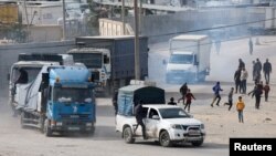 រថយន្តដែលដឹក​ជំនួយ​បាន​ធ្វើ​ដំណើរ​ទៅ​ដល់​ក្រុង Rafah ភាគខាងត្បូង​តំបន់​ហ្កាហ្សា កាលពីថ្ងៃទី១៧ ខែមករា ឆ្នាំ២០២៤។ 