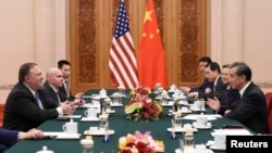 中國外交部長王毅2018年6月14日在北京人民大會堂會見了美國國務卿蓬佩奧。
