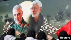 Iraqi women gather at the scene where Iran's Quds Force top commander Qassem Soleimani and Iraqi militia commander Abu Mahdi al-Muhandis were killed in a U.S. airstrike at Baghdad airport, Iraq, February 13, 2020.