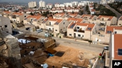 FILE - A construction site in the West Bank Jewish settlement of Ariel, Jan. 25, 2017.