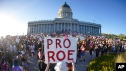 People attend an abortion-rights protest at the Utah State Capitol in Salt Lake City after the Supreme Court overturned Roe v. Wade, June 24, 2022. 