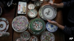 Step into Yuet Tung China Works, Hong Kong’s last remaining hand-painted porcelain factory, and you find yourself surrounded by stacks of dinnerware, each piece painstakingly decorated by hand with vibrant motifs of flowers, fruits and animals.