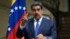 El presidente venezolano Nicolás Maduro habla en una conferencia de prensa conjunta con su homólogo iraní Ebrahim Raisi el sábado 11 de junio de 2022, en el Palacio Saadabad de Teherán, Irán. 