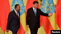 ፎቶ ፋይል፦ የኢትዮጵያው ጠቅላይ ሚኒስትር ዐቢይ አሕመድ እና የቻይናው ፕሬዚዳንት ሺ፤ ቤጂንግ፣  ቻይና እኤአ ሚያዝያ 24 2019 