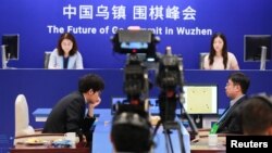 FILE - Chinese Go player Ke Jie reacts during his second match against Google's artificial intelligence program AlphaGo at the Future of Go Summit in Wuzhen, Zhejiang province, China, May 25, 2017.