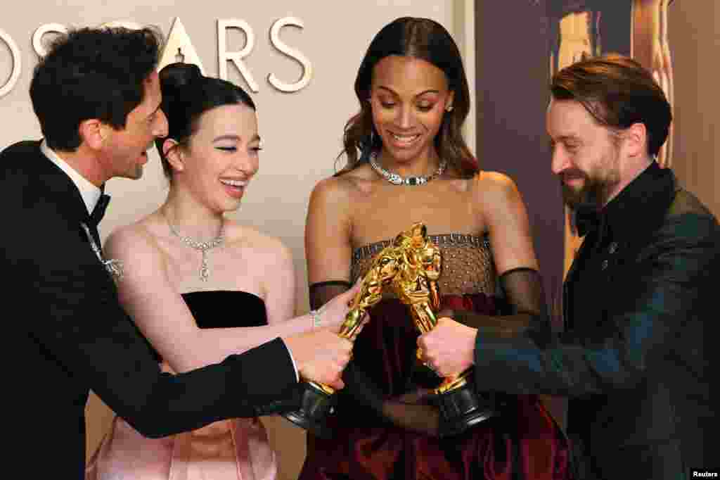 Mikey Madison, winner of the Oscar for Best Actress for "Anora", Adrien Brody, winner of the Oscar for Best Actor for "The Brutalist", Zoe Saldana, winner of the Oscar for Best Supporting Actress for "Emilia Perez", and Kieran Culkin, winner of the Oscar for Best Supporting Actor for "A Real Pain", pose in the Oscars photo room at the 97th Academy Awards in Hollywood, Los Angeles, California, March 2, 2025.