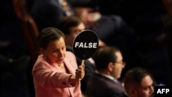 US Representative Nydia Velázquez (D-NY) protests as US President Donald Trump speaks during an address to a joint session of Congress at the US Capitol in Washington, DC, on March 4, 2025. (Photo by ALLISON ROBBERT / AFP)