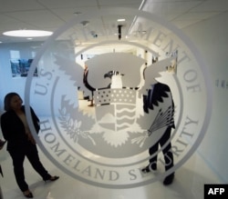 FILE - The Department of Homeland Security logo is seen at one of its annex facilities in Fairfax, Virginia, July 22, 2015.