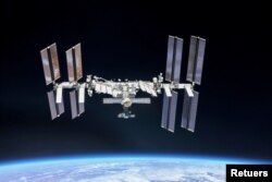 In this file photo, the International Space Station (ISS) is photographed by Expedition 56 crew members from a Soyuz spacecraft after undocking, October 4, 2018. (NASA/Roscosmos/Handout via REUTERS)