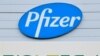 FILE - Combination of file photographs with the logo of Pfizer at the production site of the COVID-19 vaccine in Puurs, Belgium, and a logo of BioNTech at the headquarters of the company in Mainz, western Germany.