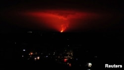 Smoke is seen rising from a fire after an attack on gas pipelines that feed electricity-generating stations, near Damascus, Syria, Jan. 3, 2014.