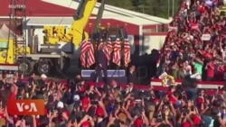 གློག་ཤུགས་རླངས་འཁོར་བཟོ་མཁན་དག་གིས་ཊམ་གྱི་རིང་ལ་རེ་ལྟོས། 