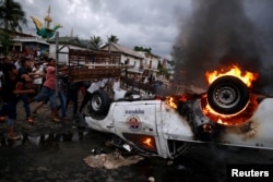 Protests erupted in Phnom Penh after Cambodia’s 2013 general election. Opposition groups believe the vote was rigged. REUTERS/Stringer