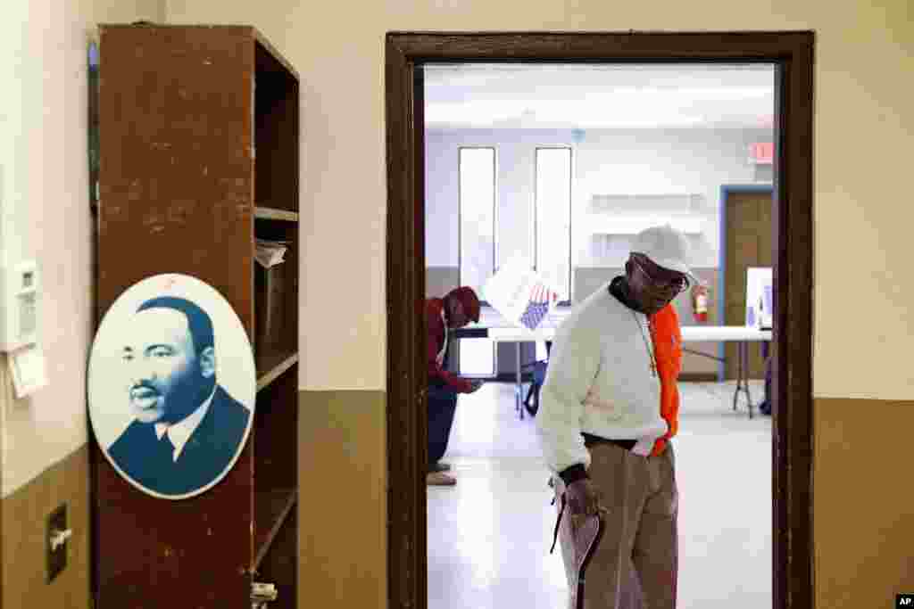 A voter departs a polling place, Feb. 29, 2020, in Charleston, S.C., after voting in the state's primary. 