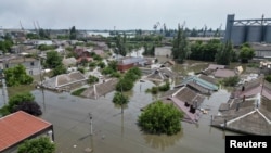 Poplavljena mesta nakon uništenja brane Nova Kahovka. (Foto: REUTERS/Vladyslav Smilianets)