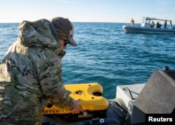 U.S. Navy participates in recovery of balloon shot down off the coast of South Carolina