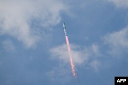 The SpaceX Starship spacecraft lifts off from Starbase in Boca Chica, Texas, on March 14, 2024. (Photo by CHANDAN KHANNA / AFP)