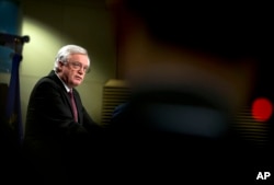 British Secretary of State for Exiting the European Union David Davis speaks during a media conference at EU headquarters in Brussels, March 19, 2018.