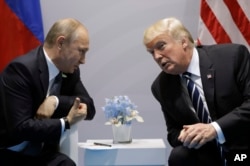 President Donald Trump meets with Russian President Vladimir Putin at G20 Summit on July 7, 2017, in Germany.