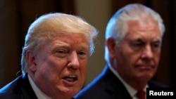 Le président Donald Trump et le secrétaire d'État Rex Tillerson, à Washington, le 7 septembre 2017.