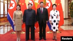 Кім Чен Ин і Сі Цзіньпін з дружинами у Пекіні
