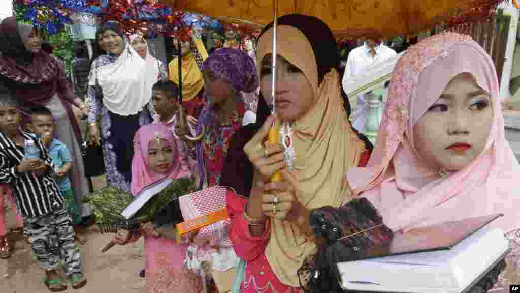 Sully, the service dog of former U.S. President George H.W. Bush in his final months, lays in front of Bush's casket at the George H. Lewis &amp; Sons funeral home in Houston, Texas, U.S.
