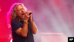 FILE - Robert Plant and The Sensational Space Shifters perform at the Bonnaroo Music and Arts Festival in Manchester, Tenn. Plant is going on tour in North America next year to support his upcoming album, 'Carry Fire.'