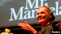 Nelson Mandela's former private assistant Zelda la Grange speaks at the launch of her book "Good Morning, Mr. Mandela" in Johannesburg, June 19, 2014.