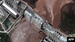 FILE - This handout satellite image obtained courtesy of Maxar Technologies on July 21, 2020, shows a view of northwestern Ethiopia that focuses on the status of the Grand Ethiopian Renaissance Dam and the Blue Nile River on July 11, 2020. 
