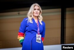 Former Danish Prime Minister Helle Thorning-Schmidt wears the rainbow-coloured armband, representing the LGBTQ community, before the FIFA World Cup group soccer match between Denmark and Tunisia at the Education City Stadium in Qatar, November 22, 2022.