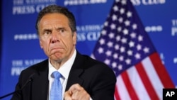 FILE - New York Gov. Andrew Cuomo speaks during a news conference, May 27, 2020, at the National Press Club in Washington. He gave his last daily coronavirus briefing 