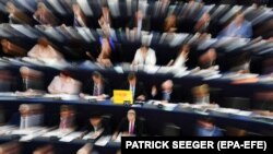 Members of Parliament vote on the copyright rules for the internet at the European Parliament in Strasbourg, France, 26 March 2019.
