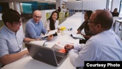Students employed by the special job programs at Ryerson University in Toronto, Canada have a meeting.