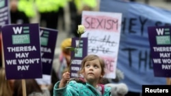 Devojčica na ženskom maršu u Londonu 19. januara 2019.