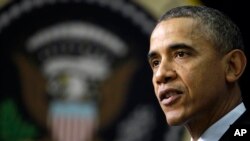 Bangladeshi laborers unload sand from cargo ship in Dhaka.