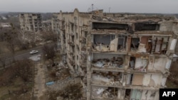 Fotografija uništenih zgrada u Izumu, nastala 1. februara 2024. (Foto: AFP/Roman Pilepy)