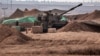 Izraelska artiljerija se sprema za napad kod grada Sderota, blizu granice sa Pojasom Gaze (Foto: Thomas COEX/AFP)
