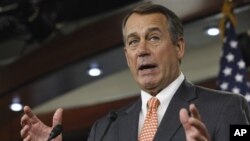 House Speaker John Boehner of Ohio gestures during a news conference on Capitol Hill in Washington, Feb. 17, 2011.