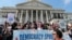 Demonstrators stage a sit-in at the Capitol in Washington, urging lawmakers to take money out of the political process, April 11, 2016.
