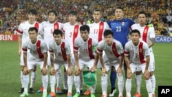 2015年1月22日澳大利亞布里斯班： 中國足球隊在亞足聯四分之一決賽前留影