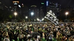 Activists hold a candlelit remembrance in Victoria Park in Hong Kong on June 4, 2020